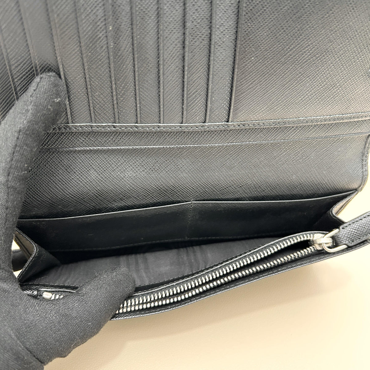 Pre-owned PRADA Calfskin Small Leather Goods Black Saffiano Leather Diagonal Metal Logo Bi fold Long Wallet