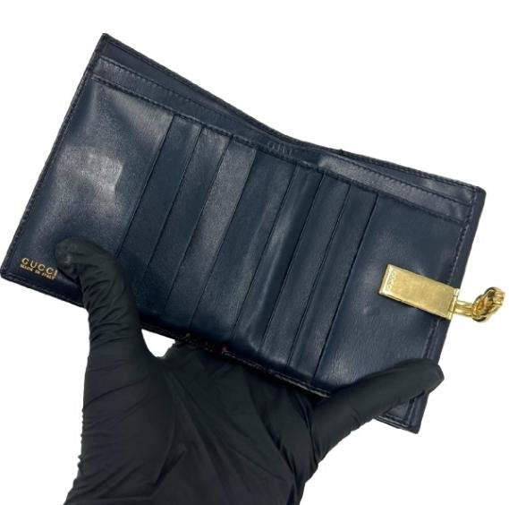 Gucci Black Smooth Leather Twist Gold‑Clasp Bifold Wallet