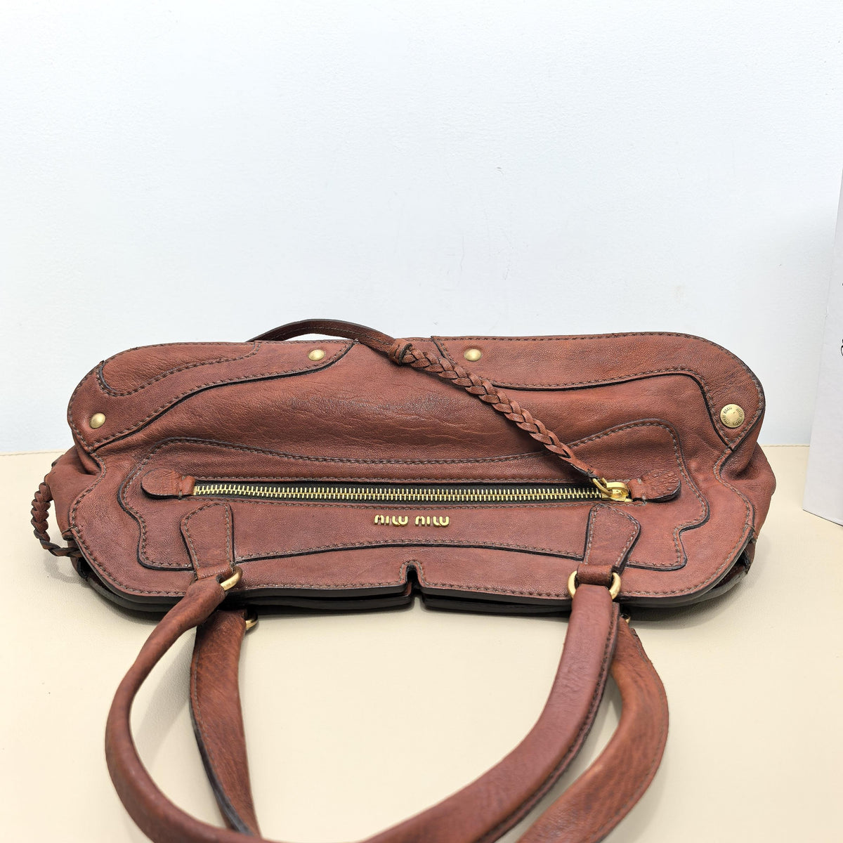 Miu Miu Vintage Dark Brown Distressed Leather Boston Handbag With Braided Strap
