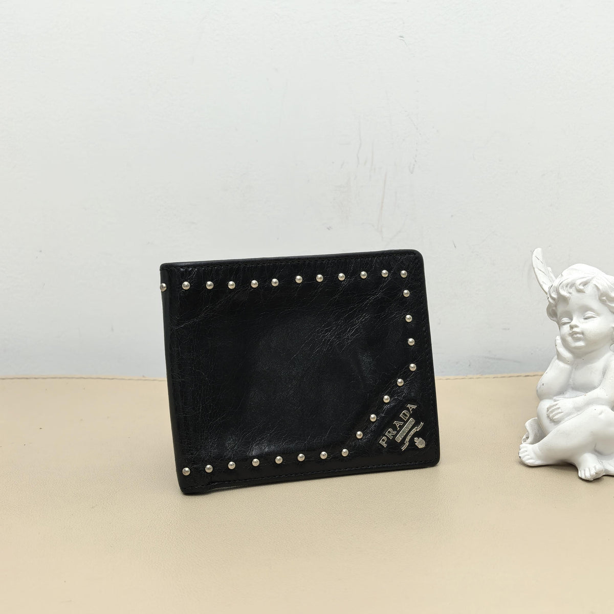 Pre-owned PRADA Calfskin Small Leather Goods Black Distressed Cracked Leather Studded Bifold Wallet