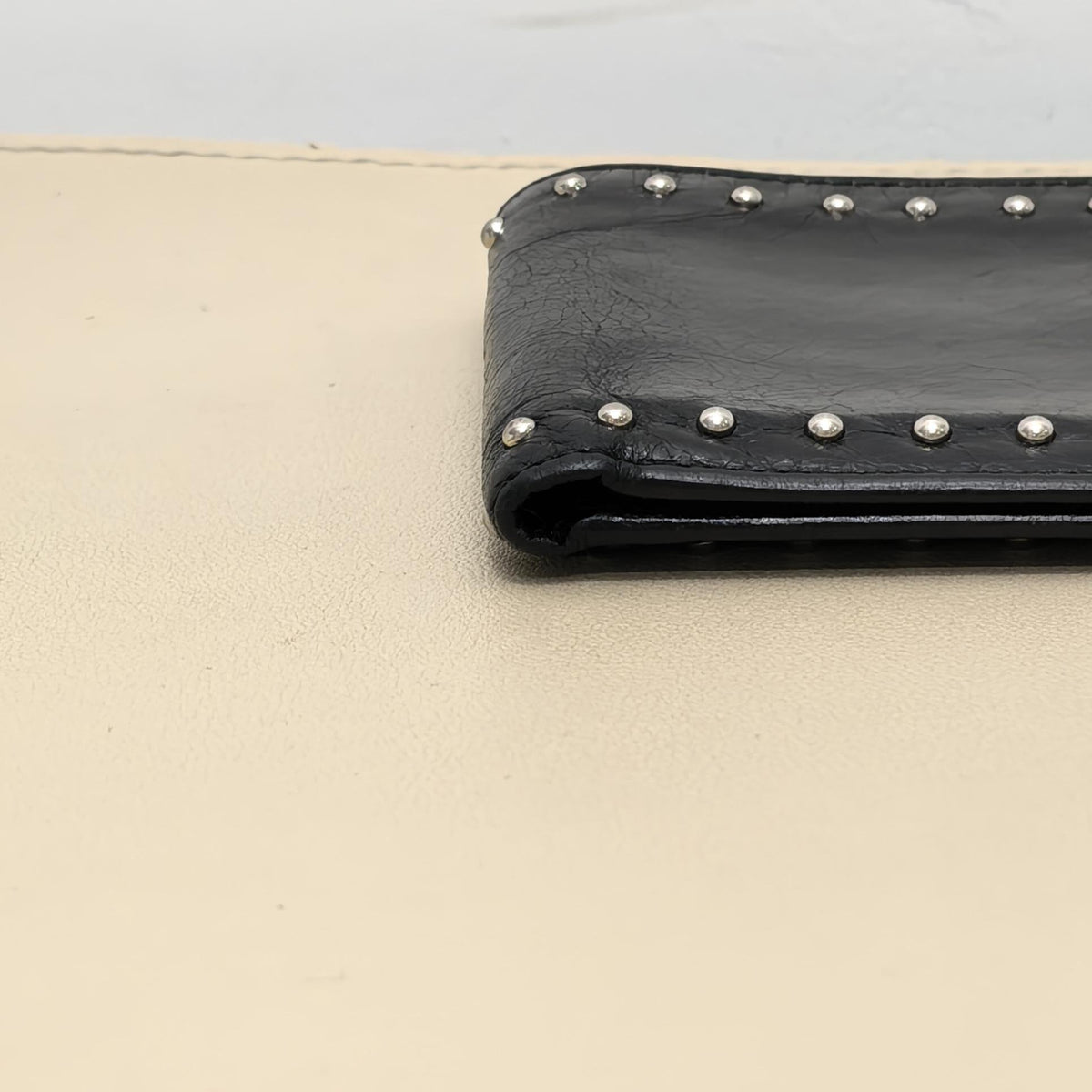 Pre-owned PRADA Calfskin Small Leather Goods Black Distressed Cracked Leather Studded Bifold Wallet