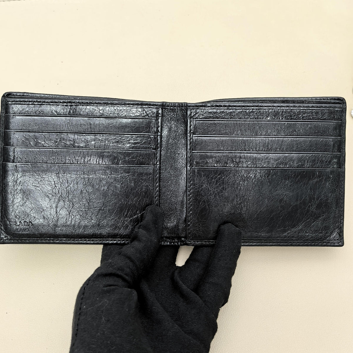 Pre-owned PRADA Calfskin Small Leather Goods Black Distressed Cracked Leather Studded Bifold Wallet