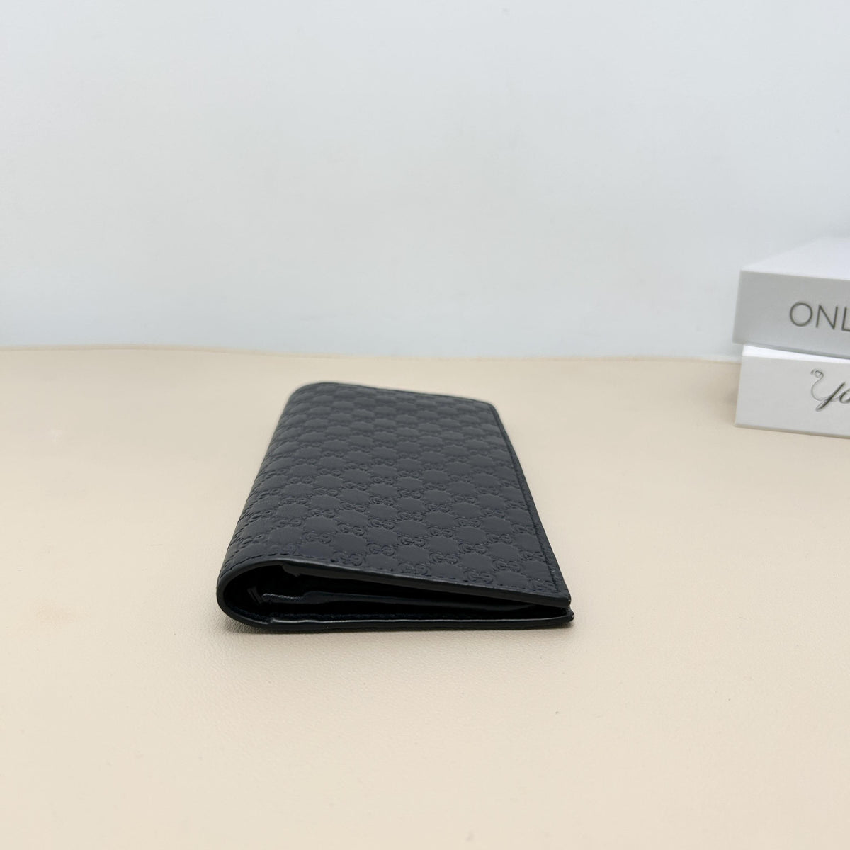 Black Micro Guccissima Embossed Bi fold Long Wallet