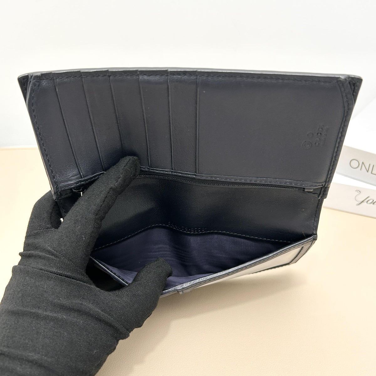 Black Micro Guccissima Embossed Bi fold Long Wallet