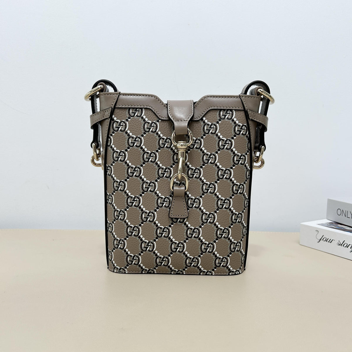 Gucci GG Embossed Leather Mini Vertical Bucket Crossbody Bag