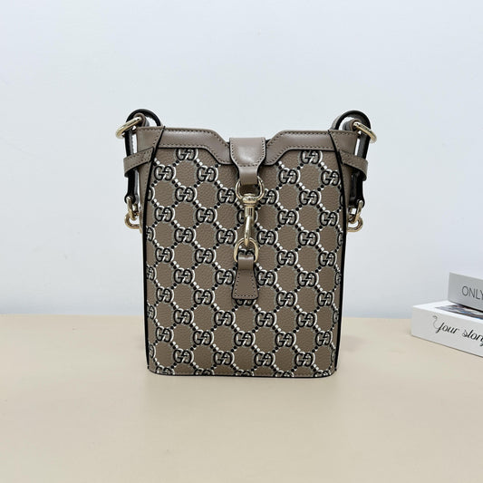 Gucci GG Embossed Leather Mini Vertical Bucket Crossbody Bag