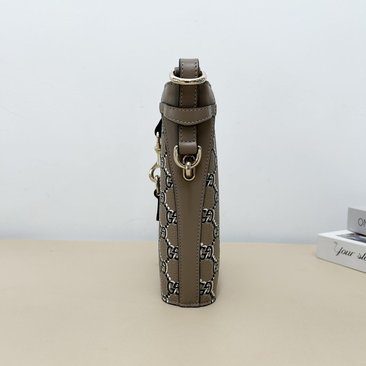 Gucci GG Embossed Leather Mini Vertical Bucket Crossbody Bag
