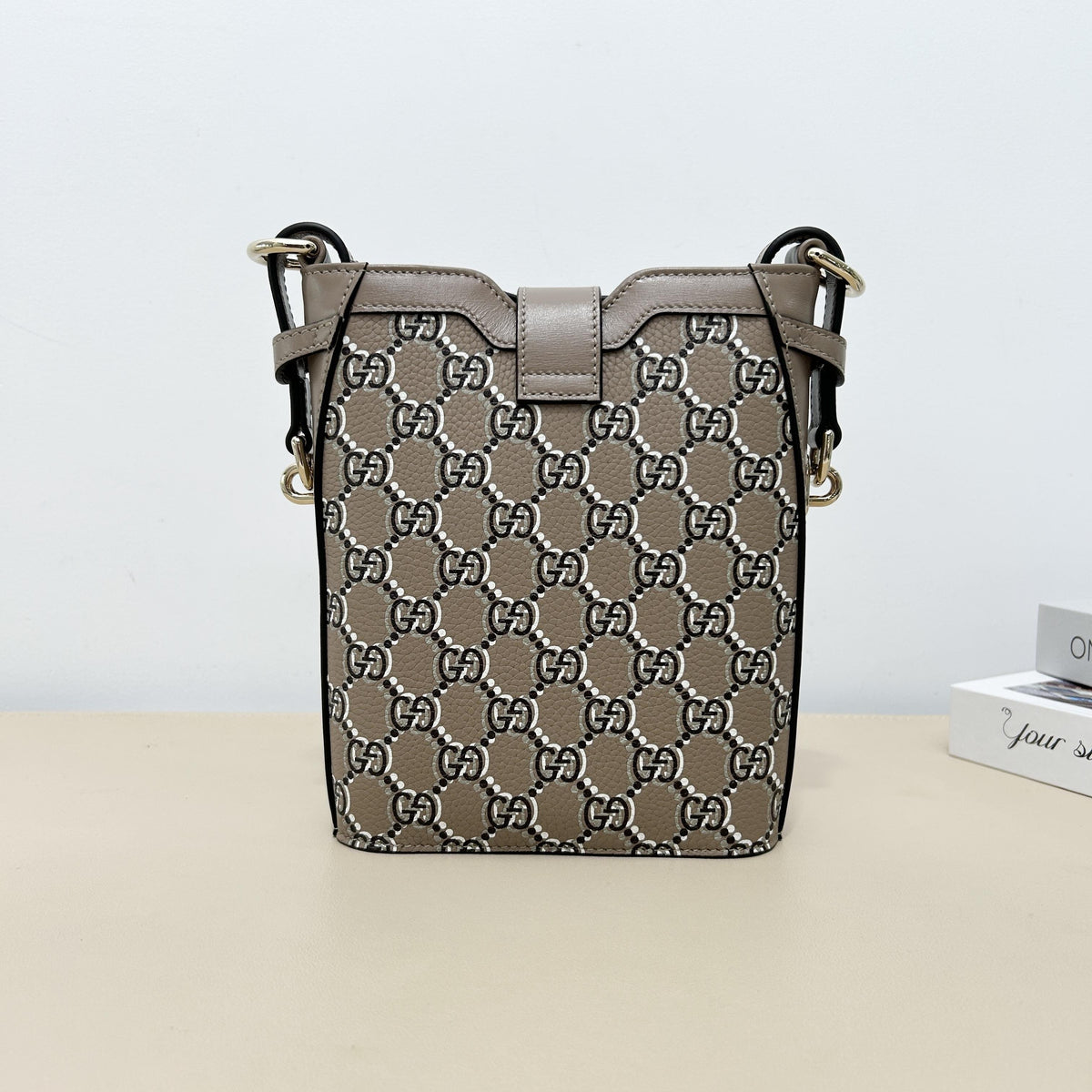 Gucci GG Embossed Leather Mini Vertical Bucket Crossbody Bag