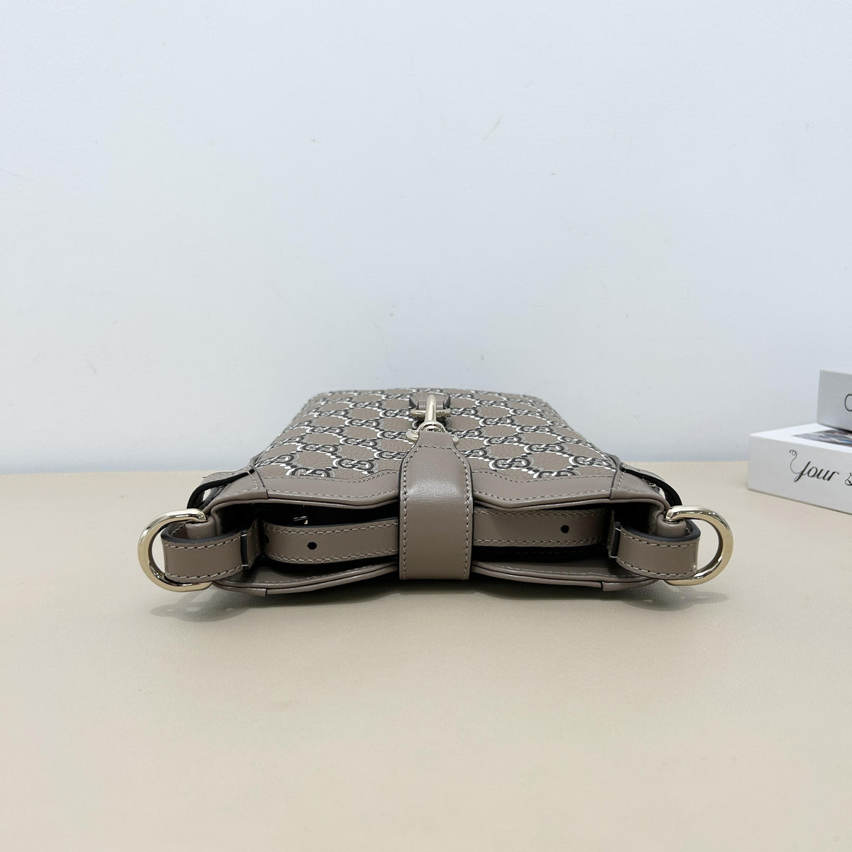 Gucci GG Embossed Leather Mini Vertical Bucket Crossbody Bag