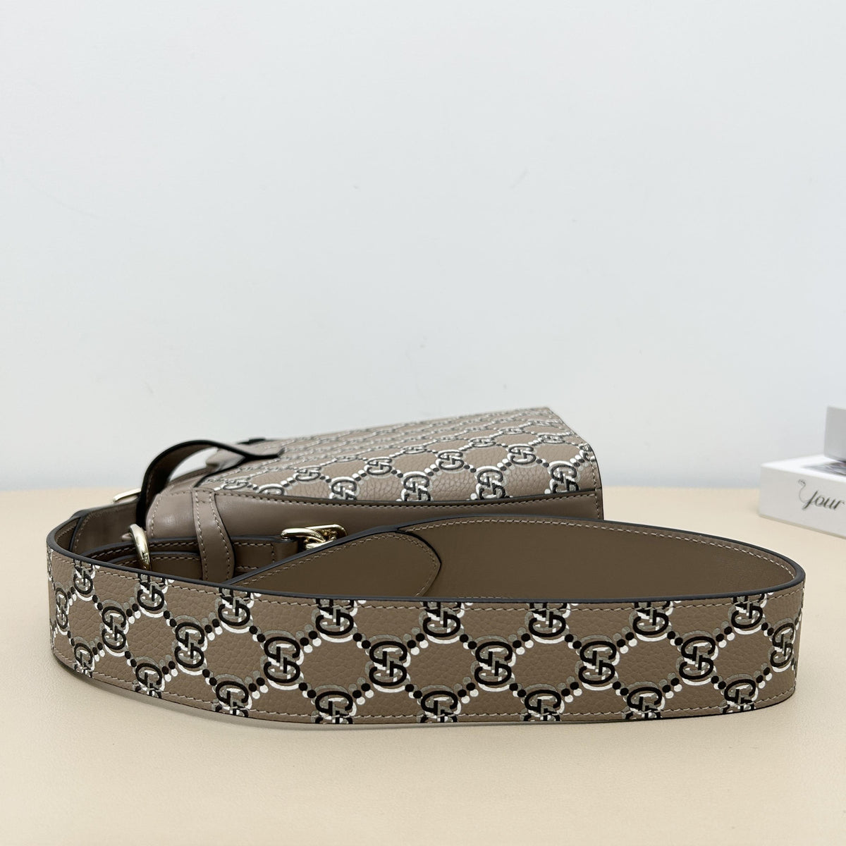 Gucci GG Embossed Leather Mini Vertical Bucket Crossbody Bag