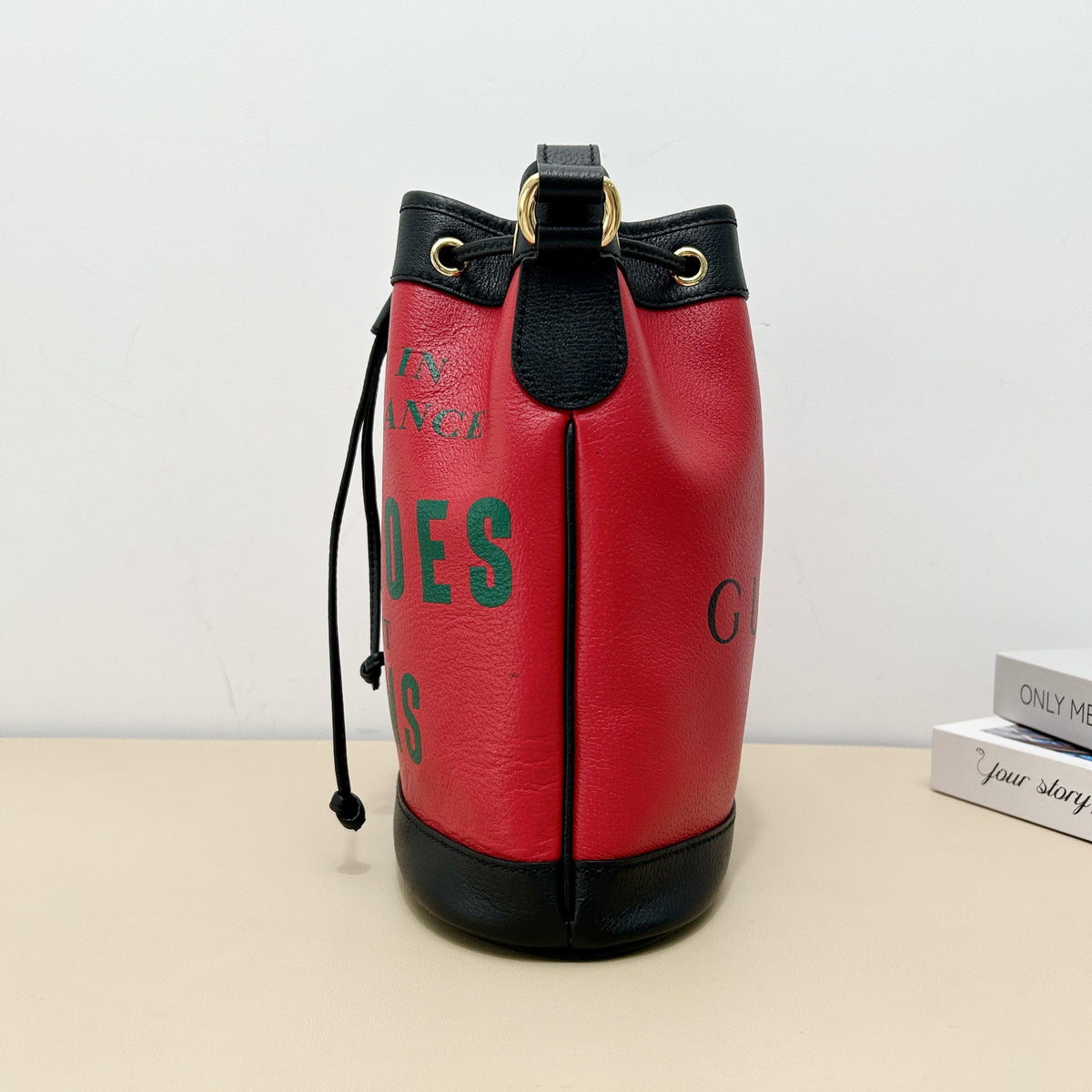 Centennial Red Leather "Gucci Shoes" Slogan Drawstring Bucket Crossbody Bag