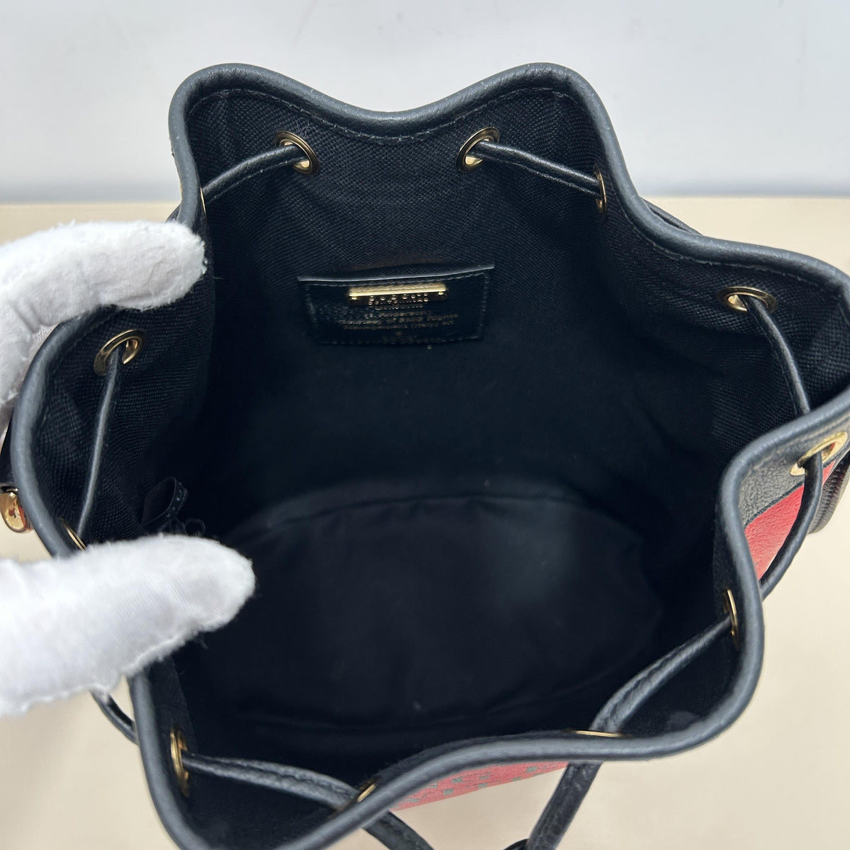 Centennial Red Leather "Gucci Shoes" Slogan Drawstring Bucket Crossbody Bag