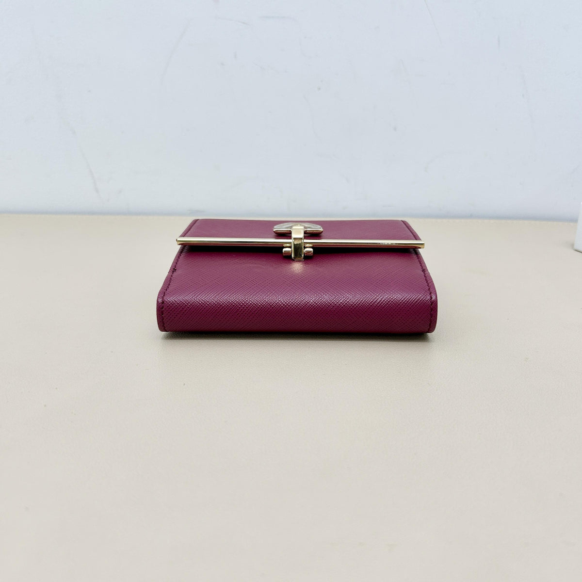 Fuchsia Saffiano Leather Gancini Gold Clasp Trifold Wallet