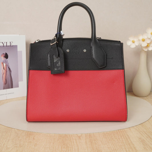 Louis Vuitton City Steamer Bi Color Taiga Leather Handbag