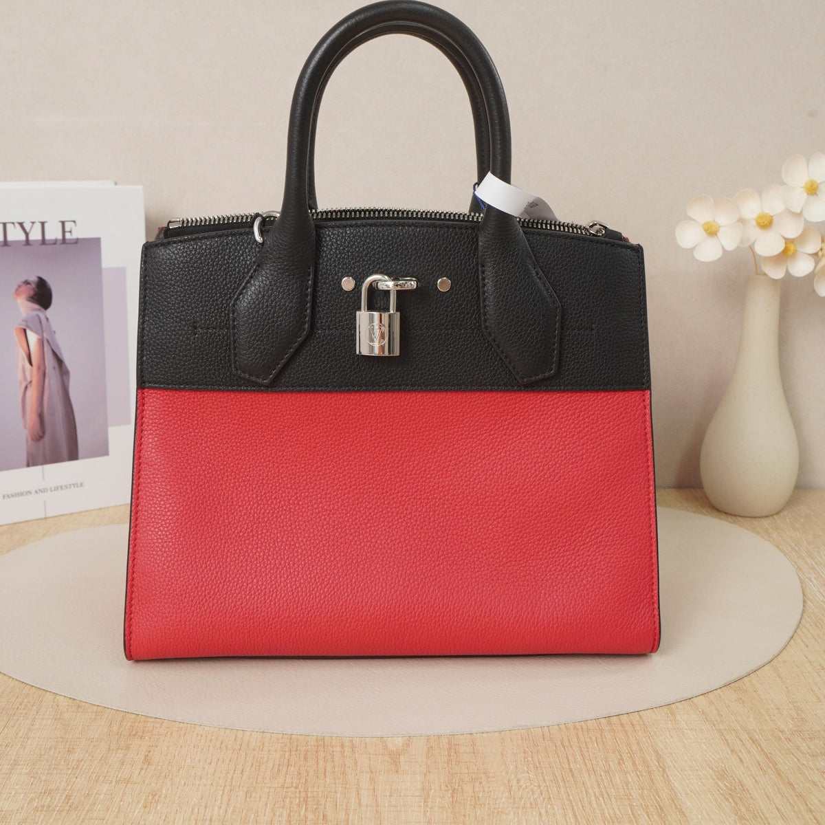 Louis Vuitton City Steamer Bi Color Taiga Leather Handbag
