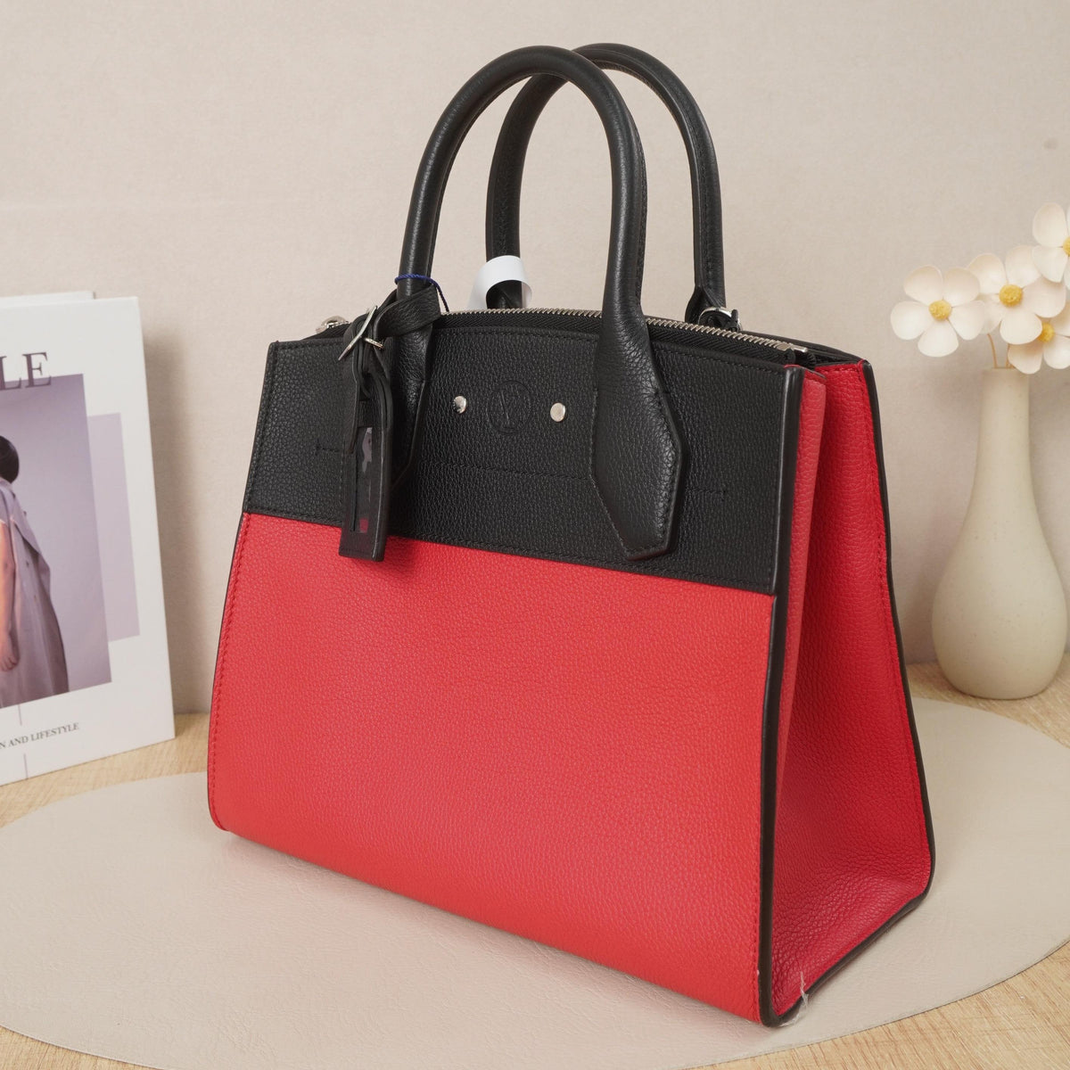 Louis Vuitton City Steamer Bi Color Taiga Leather Handbag