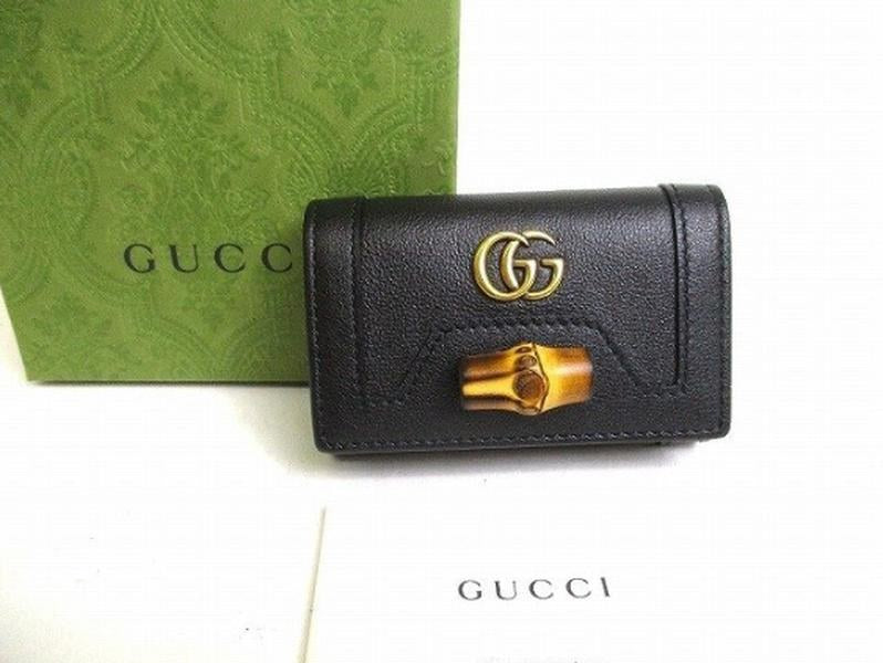 Pre-owned GUCCI Calfskin Small Leather Goods Black Grain Leather Interlocking GG Natural Bamboo Clasp Key Case