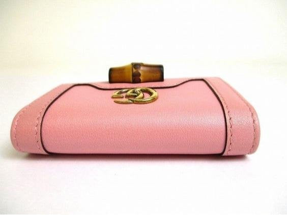 Pre-owned GUCCI Calfskin Small Leather Goods Pink Grain Leather Interlocking GG Natural Bamboo Clasp Key Case