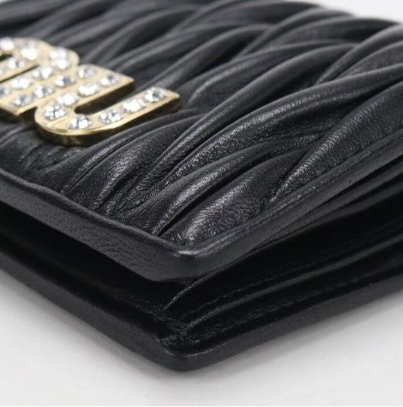 Black Matelassé Crystal Logo Bi Fold Short Wallet